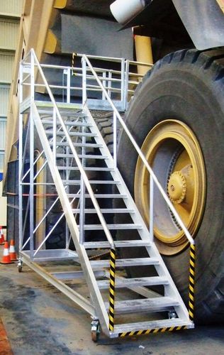 Cantilevered platform ladder, accessed via brake 